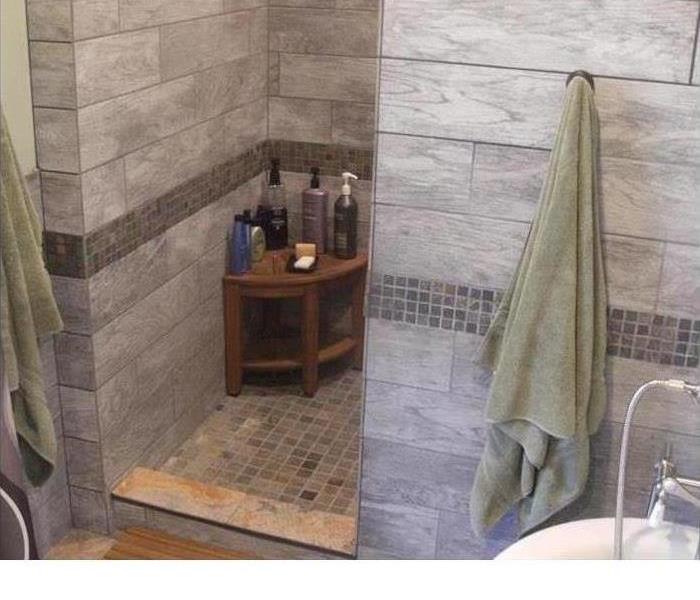 shower that had been damaged by water 