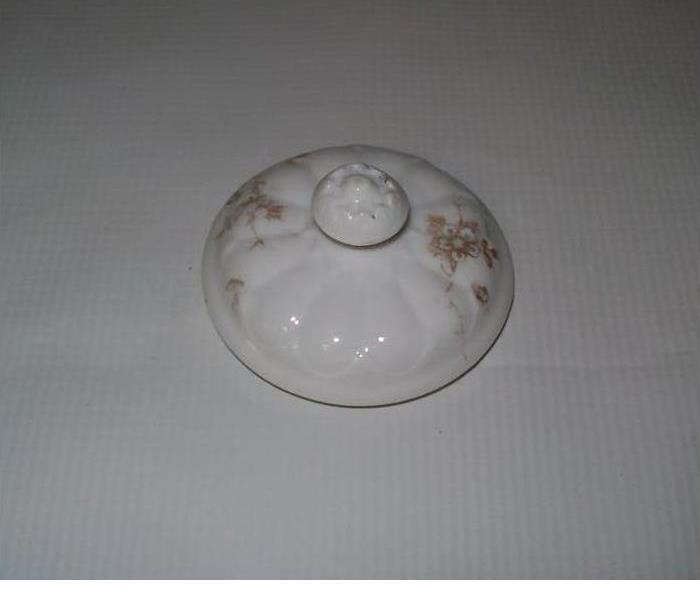 a cleaned up top of a ceramic item