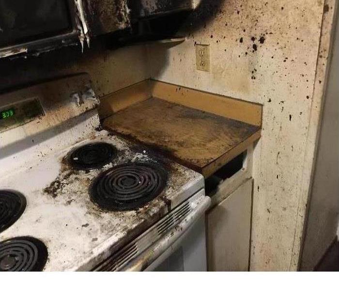 Fire damaged kitchen appliance 